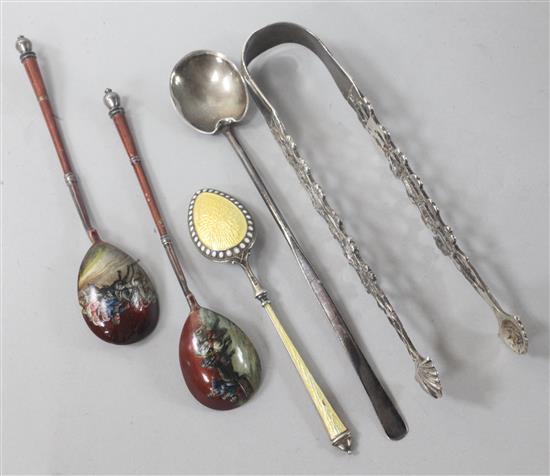 Two Russian enamelled spoons, A Scandinavian silver and enamel spoon, one other silver spoon and a pair of Georgian tongs.